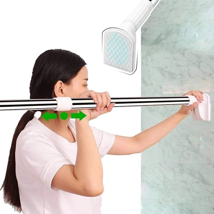 Person using a shower head extension with a white background
